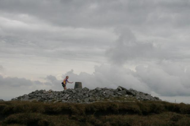Deirdre touches the trig point